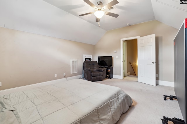 bedroom with lofted ceiling, light carpet, and ceiling fan