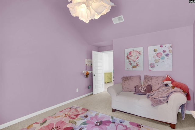 bedroom featuring a chandelier and carpet flooring