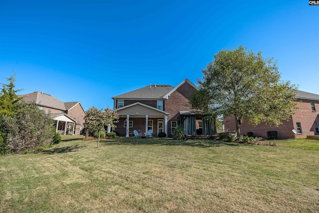 view of front of home with a front yard