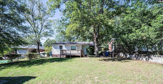 view of yard featuring a deck