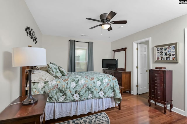 bedroom featuring wood-type flooring and ceiling fan