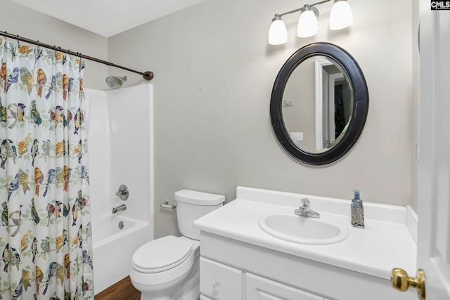 full bathroom featuring toilet, hardwood / wood-style floors, shower / tub combo with curtain, and vanity