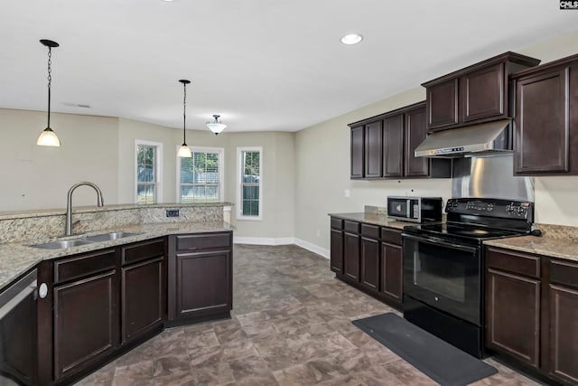 kitchen featuring black range with electric cooktop, sink, pendant lighting, and light stone counters