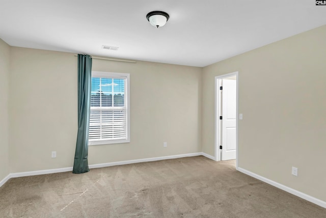 view of carpeted spare room