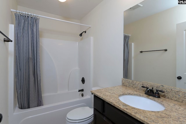 full bathroom with toilet, shower / bath combo with shower curtain, and vanity