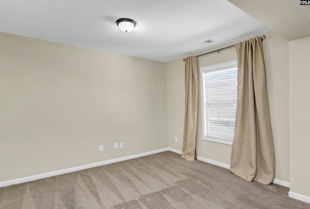 view of carpeted spare room