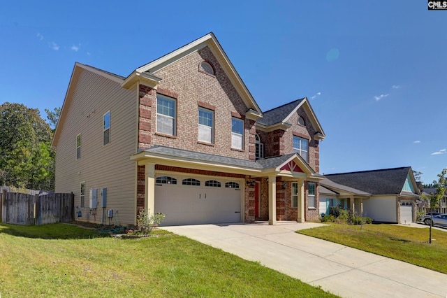 view of front of home featuring a front yard and a garage