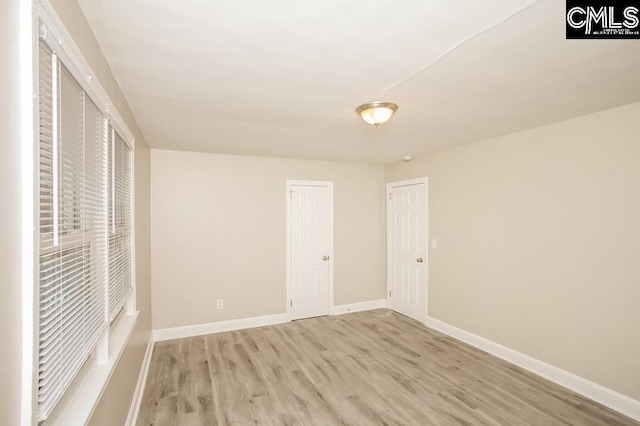 unfurnished bedroom featuring light hardwood / wood-style floors