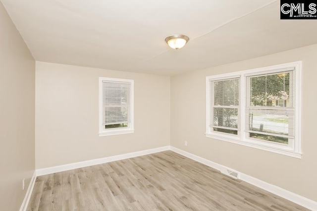 unfurnished room featuring light hardwood / wood-style flooring