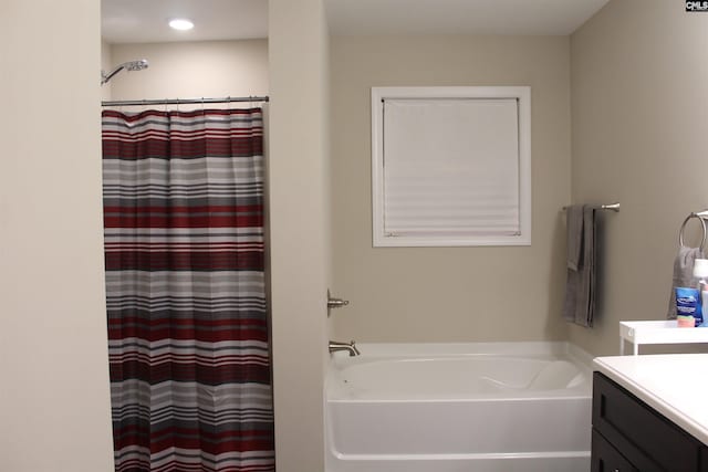 bathroom with vanity and plus walk in shower