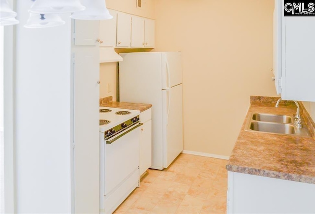 kitchen featuring white appliances, custom range hood, white cabinetry, and sink