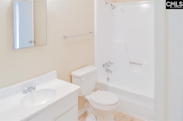 full bathroom featuring vanity, toilet, tile patterned floors, and bathing tub / shower combination