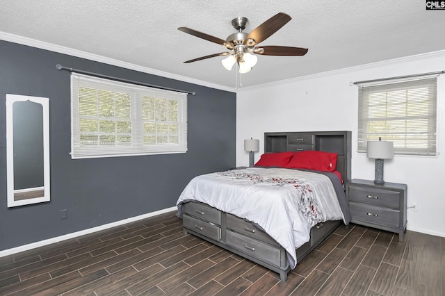 bedroom featuring wood finished floors, ceiling fan, baseboards, a textured ceiling, and crown molding