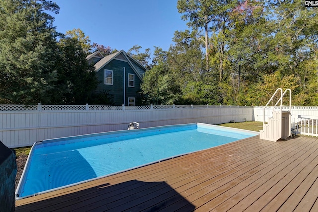 view of pool featuring a wooden deck