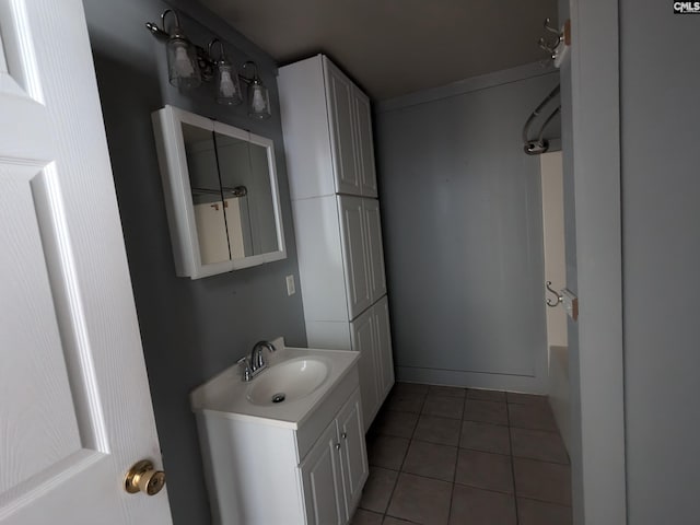 bathroom with vanity and tile patterned flooring