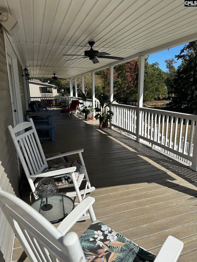 wooden deck with ceiling fan