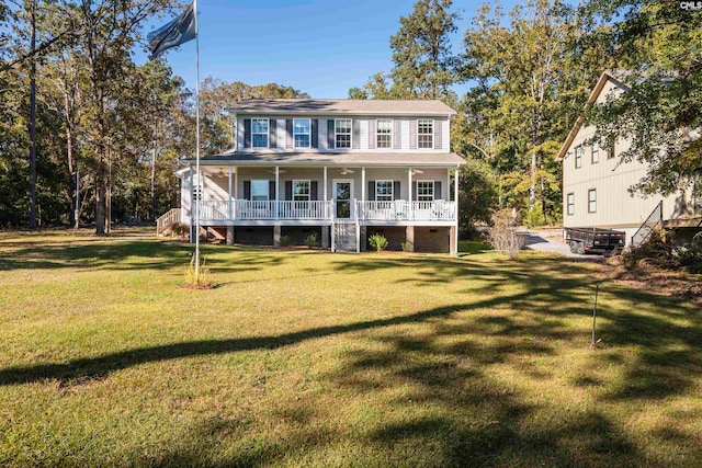 view of front of house with a porch and a front lawn