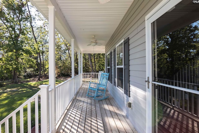 deck featuring ceiling fan and a porch