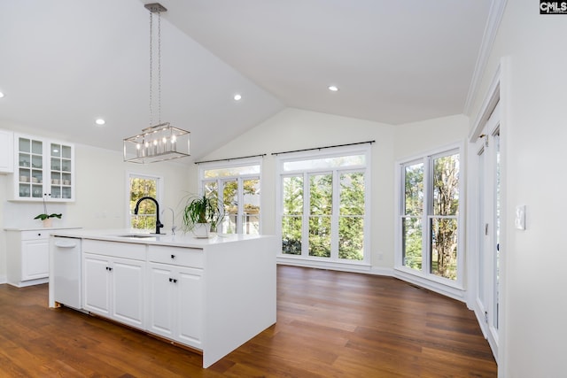 kitchen with white cabinets, decorative light fixtures, and dark hardwood / wood-style floors