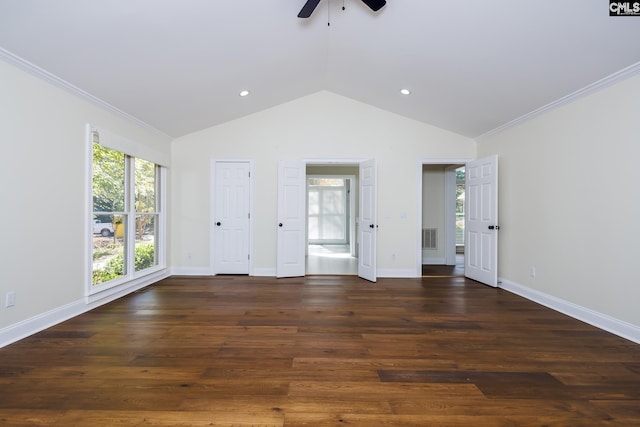 spare room with ornamental molding and dark hardwood / wood-style floors