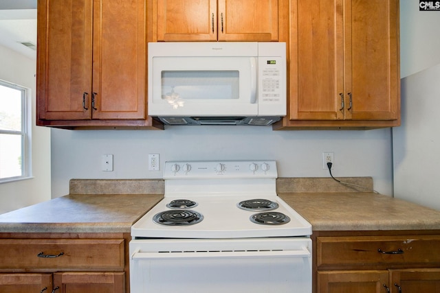 kitchen featuring white appliances