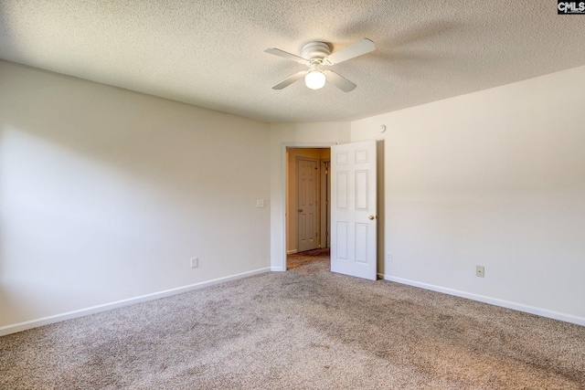 carpeted empty room with a textured ceiling and ceiling fan