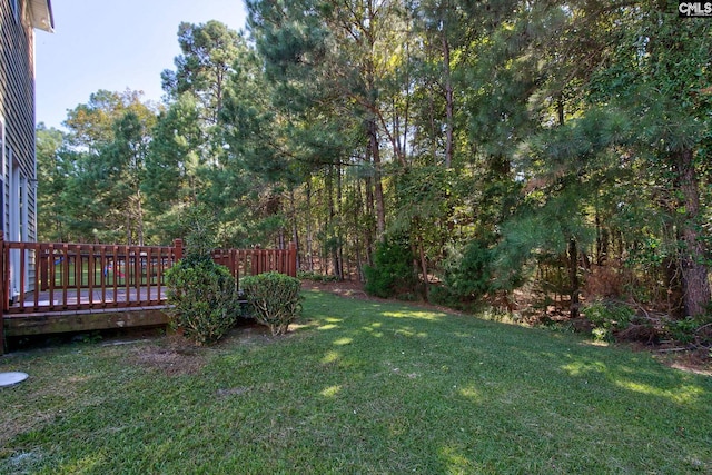 view of yard featuring a deck