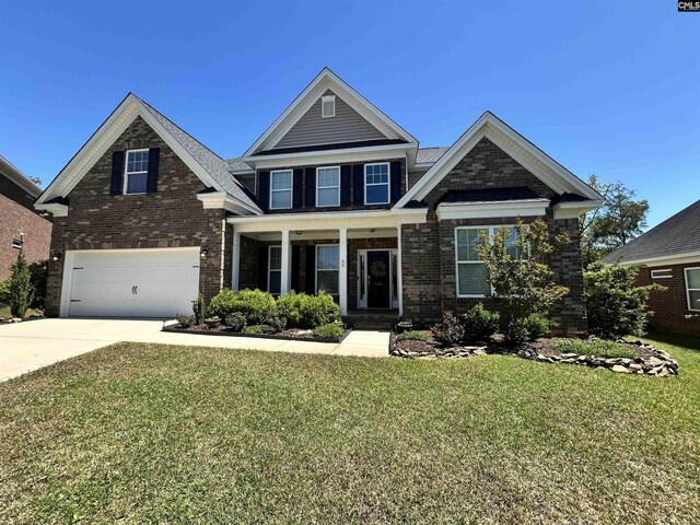 60 Fork Branch Ct, Irmo, SC 29063 - view of front of house with an attached garage, a front lawn, brick siding, and concrete driveway
