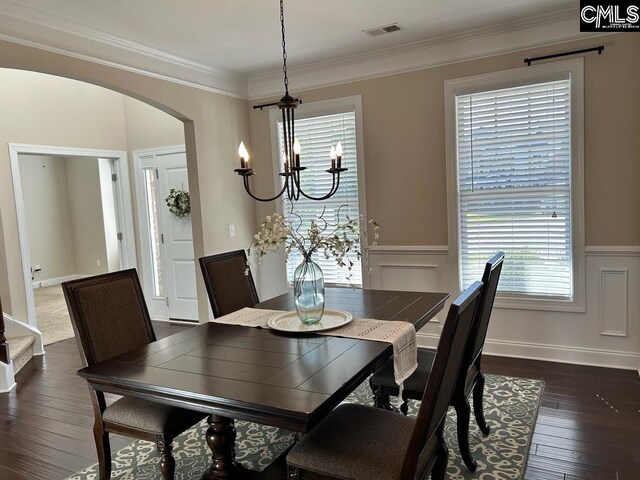 60 Fork Branch Ct, Irmo, SC 29063 - dining space featuring arched walkways, wainscoting, visible vents, a notable chandelier, and ornamental molding