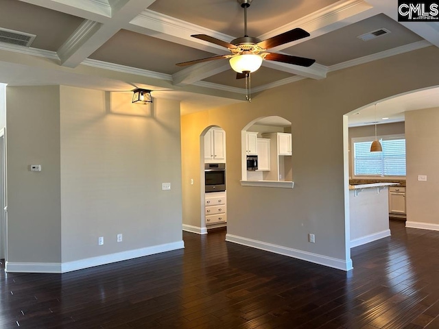 unfurnished living room with ceiling fan, dark hardwood / wood-style flooring, beamed ceiling, crown molding, and coffered ceiling