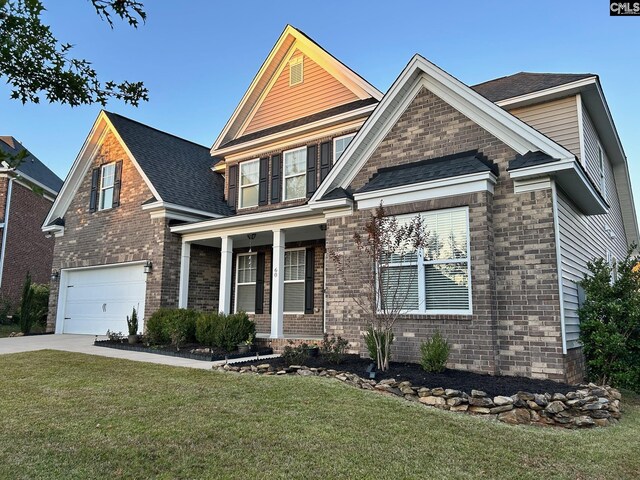 60 Fork Branch Ct, Irmo, SC 29063 - view of front facade with concrete driveway, an attached garage, a front lawn, and covered porch