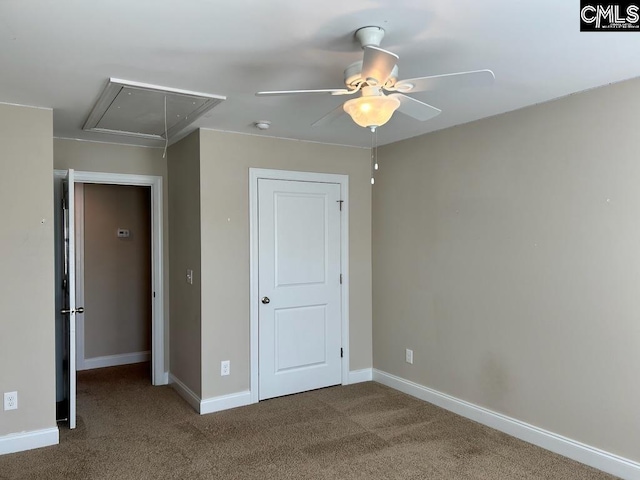 unfurnished bedroom with ceiling fan and carpet flooring