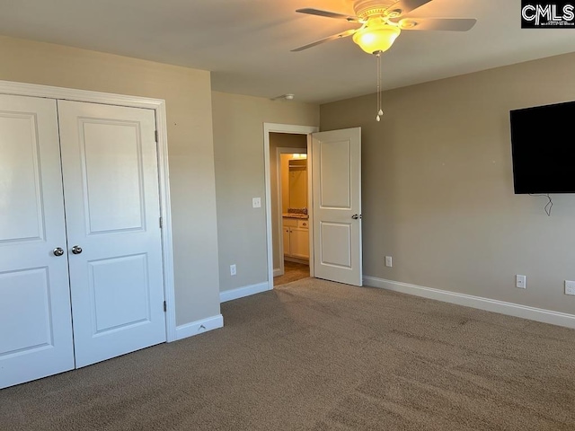 unfurnished bedroom featuring a closet, ceiling fan, and carpet