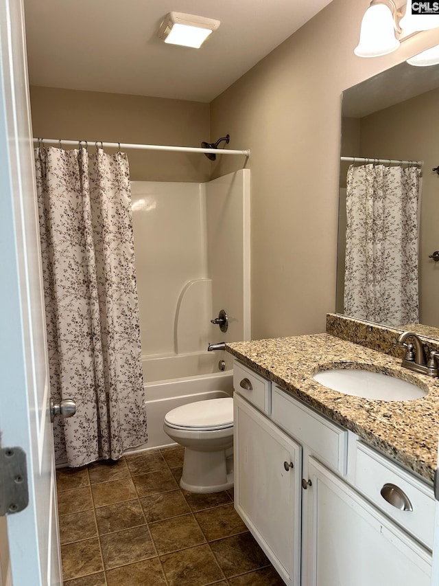 full bathroom with vanity, toilet, shower / bath combo, and tile patterned flooring