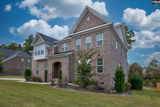 view of front facade with a front lawn