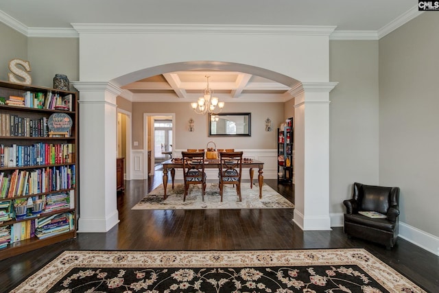 dining space featuring crown molding, dark hardwood / wood-style flooring, and coffered ceiling