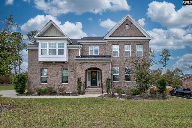 view of front of home with a front yard