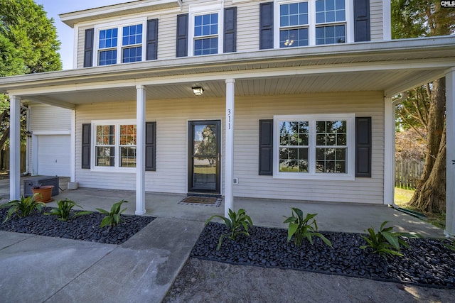 doorway to property with a porch