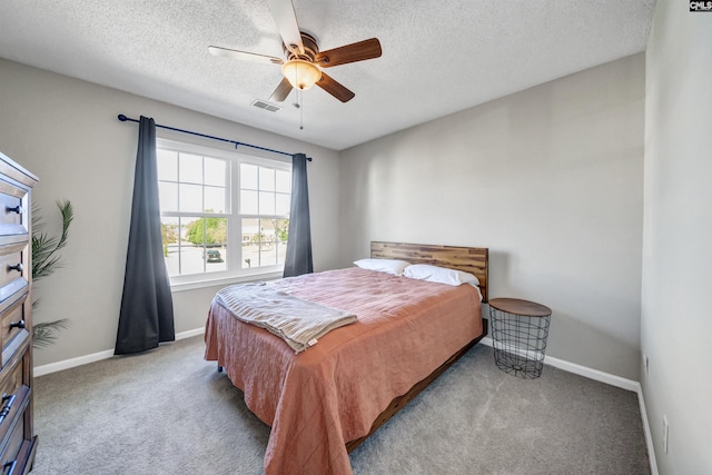 bedroom featuring carpet flooring, baseboards, and visible vents