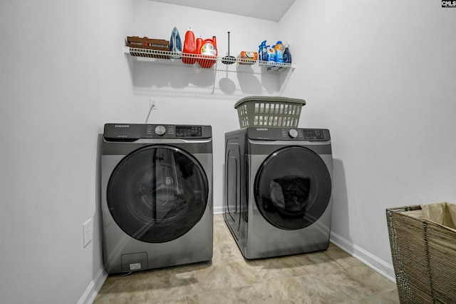 laundry area with washer and clothes dryer