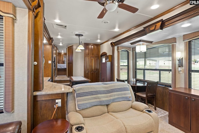 bedroom with crown molding and ceiling fan