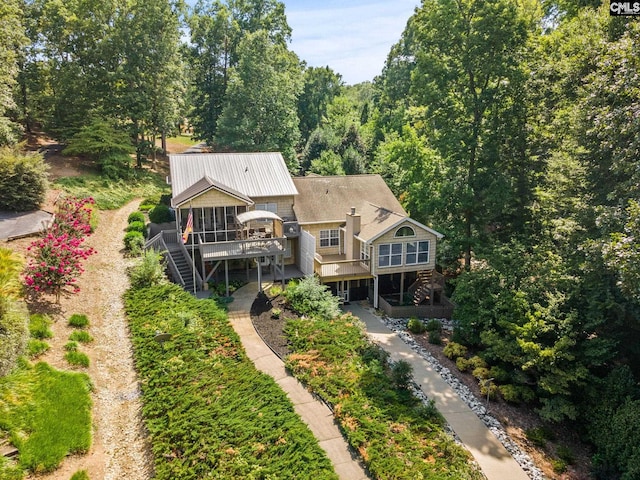 rear view of property with a deck