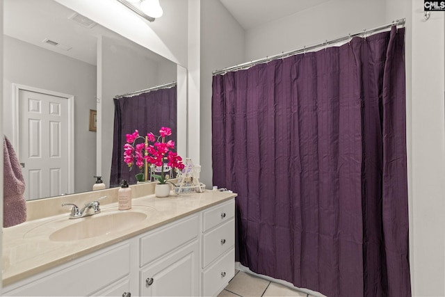 bathroom featuring vanity and tile patterned floors