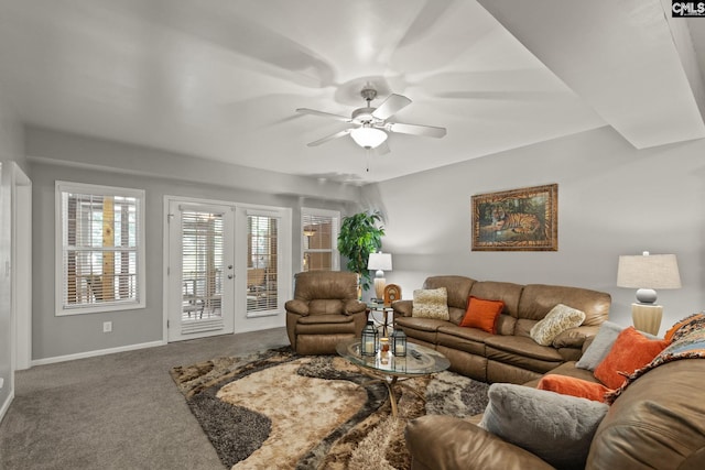 living room featuring french doors, carpet flooring, and ceiling fan