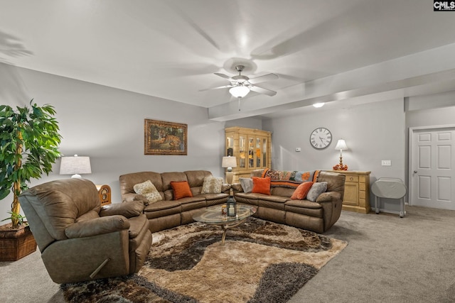 living room featuring carpet floors and ceiling fan