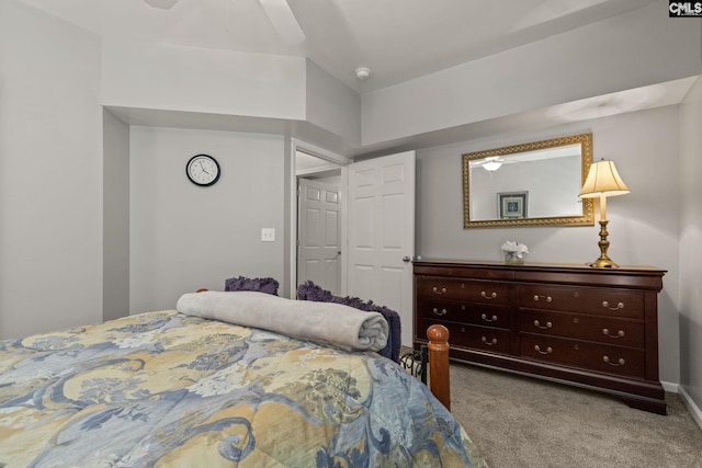 bedroom featuring ceiling fan and light colored carpet