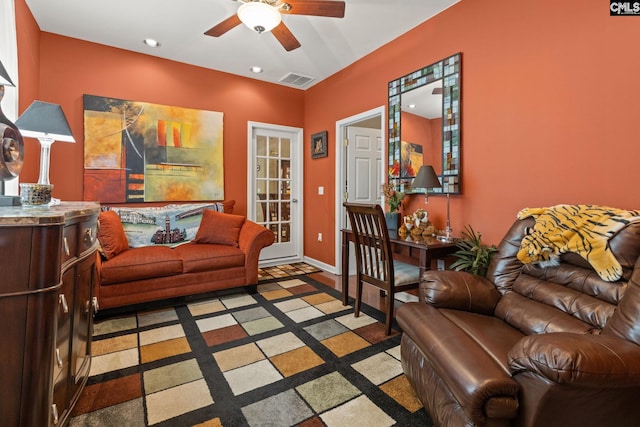 living room featuring ceiling fan