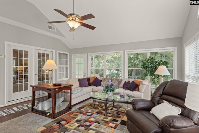 sunroom with french doors, ceiling fan, and vaulted ceiling