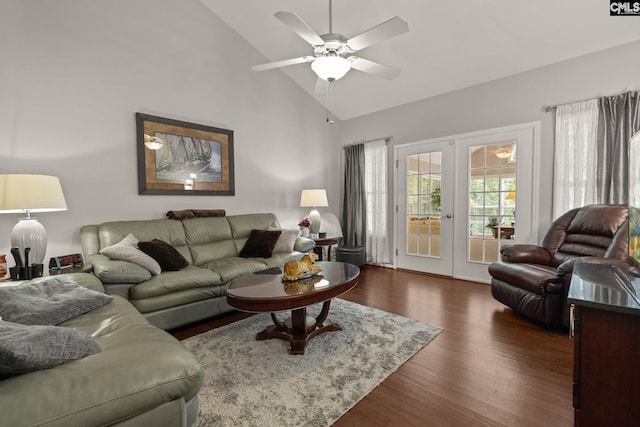 living room with french doors, dark hardwood / wood-style floors, high vaulted ceiling, and ceiling fan