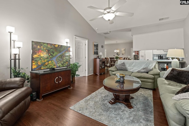 living room featuring ceiling fan, high vaulted ceiling, and dark hardwood / wood-style floors